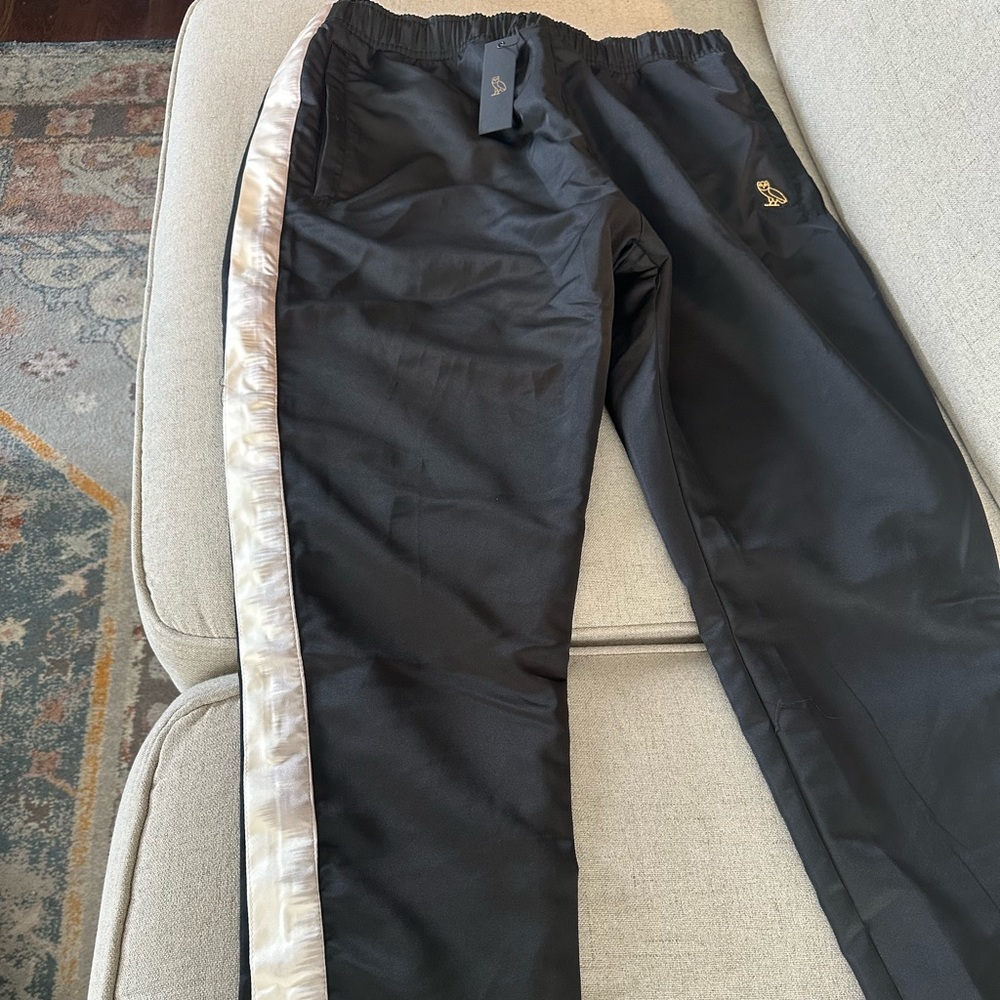 OVO satin sweat pants with snap buttons on the side